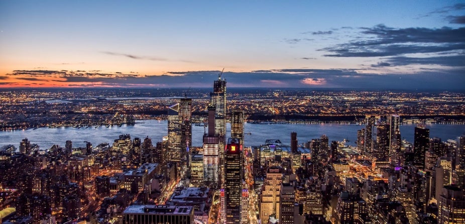 An aerial view of New York City at sunset.