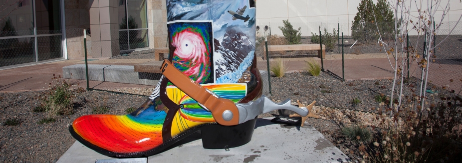 Boot sculpture featuring atmospheric phenomena