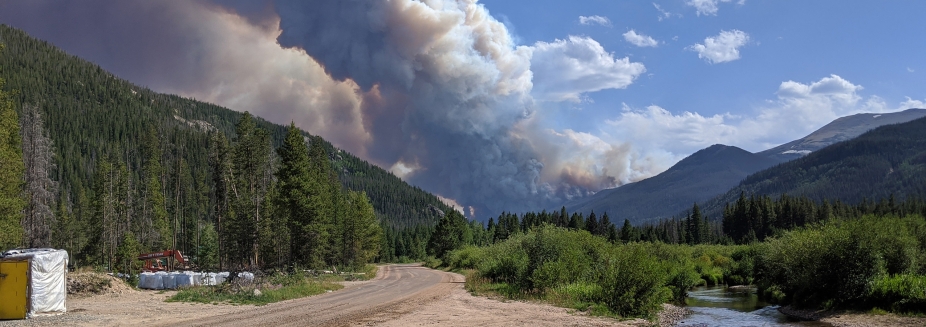 The Cameron Peak wildfire rages on a distant peak