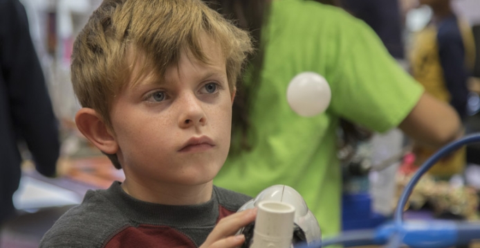 A child at UCAR SciEd's Super Science Saturday