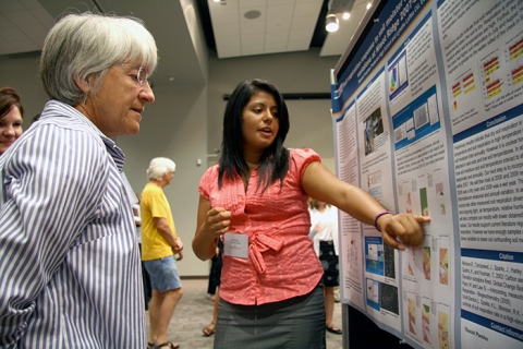 An REU student presenting at a conference