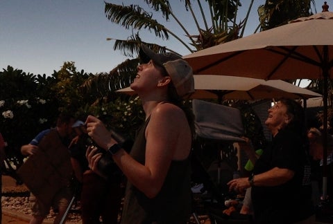 Onlookers view a total solar eclipse