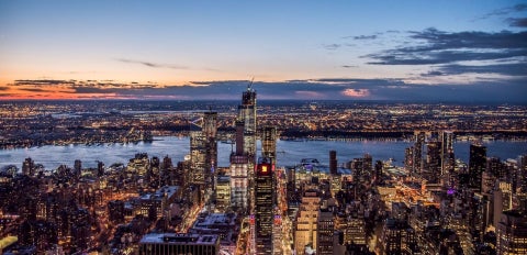 An aerial view of New York City at sunset.