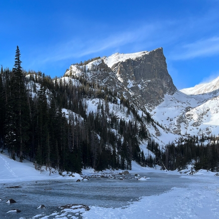 Wintery landscape of a mountain and a frozen lake
